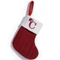 Red cable-knit Christmas stocking with white cuff featuring red embroidered letter C - Letter C Embroidery Style