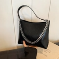 Chic black chain bucket bag with wrinkled oil leather texture and silver metal hardware - Black