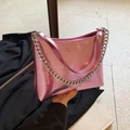 Metallic pink chain bucket bag with glossy finish and silver link strap for women - Pink