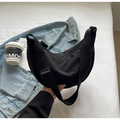 Detail of black nylon dumpling bag with adjustable wide strap for daily casual wear - No Pendant / Black