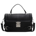 Women's black faux snake leather crossbody bag with silver wing-shaped buckle - Black