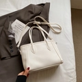 Chic white pebble leather tote bag with round handles and adjustable crossbody strap - No Pendant / Off White