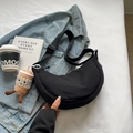 Black crescent nylon crossbody bag with cute coffee cup plush pendant on denim - Black with Pendant