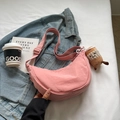 Pink crescent canvas crossbody bag with adjustable strap and cute plush charm - Pink with Pendant