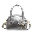 Silver cracked leather shell bag with pearl bow and heart charm on white background - Silver