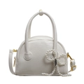 Elegant white shell-shaped bowling bag with pearl bow charm and adjustable strap - Off-white
