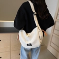 Borsa a mezzaluna in tela bianco crema con dettaglio zip arancione e tracolla regolabile - Bianco Sporco