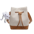 Fashionable beige canvas bucket bag with brown leather trim and plush cloud charm - Off-white With Pendant