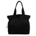 Grande borsa tote in tela nera con coulisse laterali e tracolla minimalista per pendolari - Nero