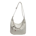 Creamy white hobo bag featuring marble texture, silver chain, and pearl accents - Off-white