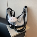 Denim patchwork crescent crossbody bag in grey and black with plush cloud charm - Black