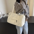 Large cream-white canvas travel tote bag with long shoulder straps and front zipper pocket - Off White