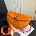 Orange nylon crossbody saddle bag with dual zippers and adjustable shoulder strap - Orange