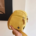 Minimalist yellow nylon crossbody phone bag with adjustable strap and dual zip compartments - Yellow