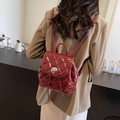 Chic burgundy quilted mini backpack with glossy finish and elegant metal twist lock - Burgundy