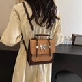 Zaino retrò in pelle bicolore con chiusura a farfalla in argento vintage sul davanti - Cachi con Caffè