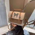 Chic beige and brown crossbody bag with silver butterfly clasp and leather texture - White & Khaki