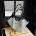 Light blue sequin tote bag with black leather handles and spacious interior design - Black