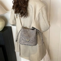 Silver metallic drawstring bucket bag with chain strap and triangular logo detail - Black