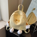 Cute yellow canvas backpack for kids featuring a smiley face and 3D plush arms and legs - Yellow