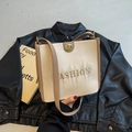 Crèmekleurige draagtas met bruine bies, FASHION-borduurwerk en gouden draaislot - Khaki
