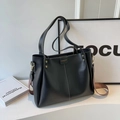 Large black leather tote bag with white contrast stitching and a stylish wide shoulder strap - Black