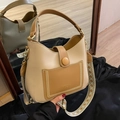 Women's minimalist beige and brown bucket bag with geometric wide strap on black satin - Apricot