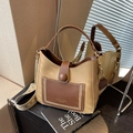 Women's minimalist khaki and brown leather bucket bag with wide patterned shoulder strap - Khaki