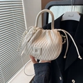 Elegant off-white matelassé bucket bag in PU leather with adjustable crossbody strap - Off White