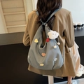 Blue canvas tote backpack with colorful heart patches and a smiling cloud plush charm - Blue with Pendant