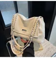White quilted faux leather shoulder bag with silver chain strap and metal logo plate - White