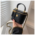 Black quilted mini vanity bag with gold camellia detail and chain strap - Black