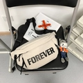 Beige canvas crossbody bag with black FOREVER print and small orange donkey charm - White With Pendant