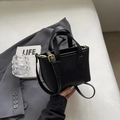 Minimalist black bucket bag with lychee texture and adjustable golden strap for women - No Pendant / Black