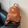 Caramel brown backpack with bear print, gold bear zipper, and stylish metal studs - Brown