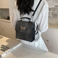 Sac à dos rétro gris foncé avec fermoir papillon doré et fines bandoulières - Noir