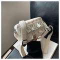 Creamy white ruffled crossbody bag with a wide woven shoulder strap and zipper closure - Off White