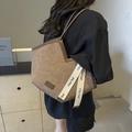 Light brown canvas tote bag with dark brown leather straps and decorative ribbons - Khaki