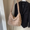 Chic beige quilted puffer tote bag with a soft padded texture and wide shoulder strap - Khaki
