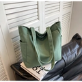 Minimalist grass green canvas tote bag with side pockets and magnetic buckle closure - Green