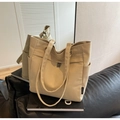 Minimalist beige canvas tote bag with wide shoulder straps and side pockets - Khaki