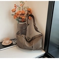 Detailed view of dark brown pleated soft leather crescent bag with stylish wide shoulder strap - Khaki Brown