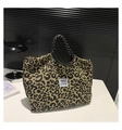 Large leopard print tote bag with yellow animal pattern and braided rope handles - Black
