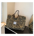 Knitted leopard print tote bag with thick texture and black-white rope handles - Brown