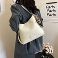 White lychee leather bucket bag with cute bunny pendant and wide shoulder strap - Coconut Milk White