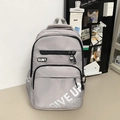 Water-resistant grey minimalist school backpack featuring GIVE UP text and side pockets - Light Gray