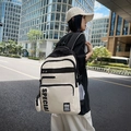 Street style cream and black patchwork backpack with vertical SPECIAL print detail - White and Black