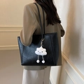 Large black tote bag with leather texture and cute cloud charm accessory on strap - Black With Pendant