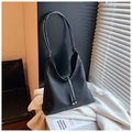 Minimalist black tote bag with long shoulder straps and silver spherical metal accents - Black