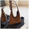 Minimalist dark brown leather tote bag featuring slim dual straps and silver metal ball accents - Brown